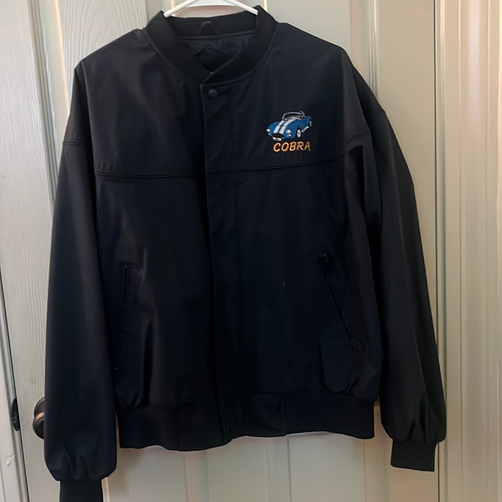 Dark blue knightsbridge bomber with cobra patch: Size Large